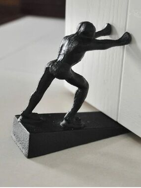 Vintage CAST IRON "Strong Man" door stopper
rustic 
hold doors open
